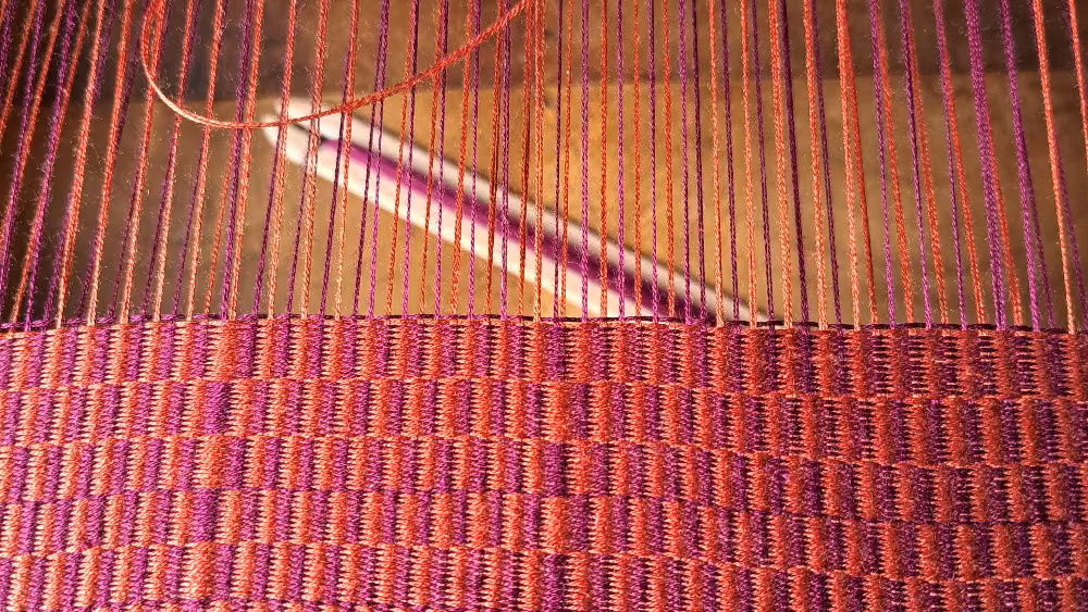 Weaving a Copper and Violet Cushion Cover