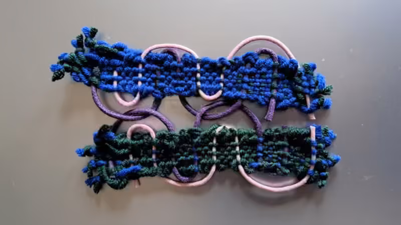 Mirrored Crete Passementerie technique with one warp and two decorative wefts