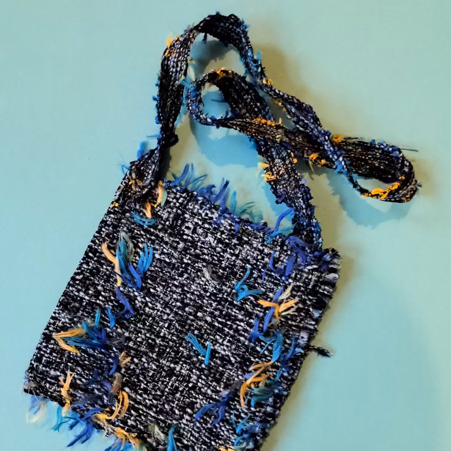 Square Novelty Bag on turquoise background